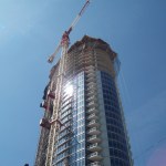 A skyscraper under construction. View from below.